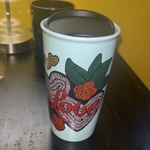 Starbucks Love stitch with hearts, flowers, light blue tall 12 oz with new lid